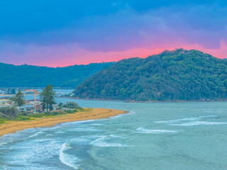 Sunrise seascape with low clouds