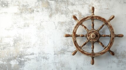 Obraz premium Vintage Wooden Ship Wheel on Textured White Wall Background