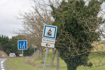 Road Signs and Trees on Rural Dordogne Country Route