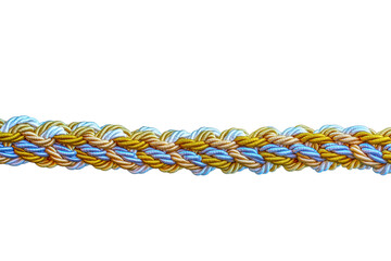 Naklejka premium Close-up view of a complexly woven rope with gold, blue, and white strands, highlighting detailed craftsmanship.