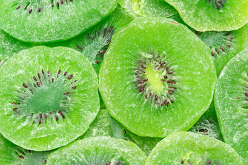 Heap of green dried kiwi slices.