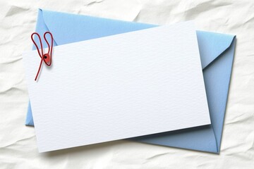 Rectangular Card with Red Paperclip on Light Blue Envelope for Invitations and Messages
