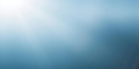 Fototapeta premium Soft morning haze with sunlight fading into blue background, soft focus, gentle light