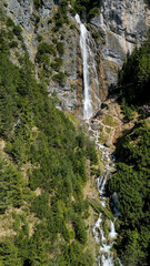 dalfazer waterfall during Spring time with deep blue background sky