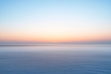 Obraz premium Morning Foggy Landscape at Dawn with Soft Pastel Sky and Calm Surface in Chiba Prefecture Kujukuri Beach