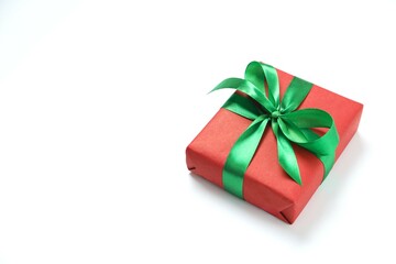 Beautiful gift box tied with bow on white background 