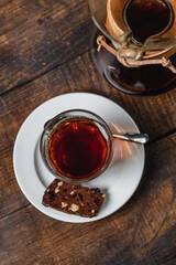 Professional barista brews coffee with pour over method. Alternative ways of brewing coffee. Coffee shop concept