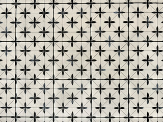 Random colonial heritage tiles black and white color, in plus and cross pattern. Suitable for heritage building flooring, colonial floor. Seamless background texture
