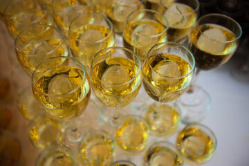 Glasses of drinks stand on the table