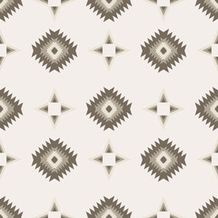 Fototapeta premium Brown geometric vector patterns that are traditional, ethnic, Navajo, or Native American Indian. Design for clothing, curtains, carpets, sarongs, Hmong, and fabric edges.