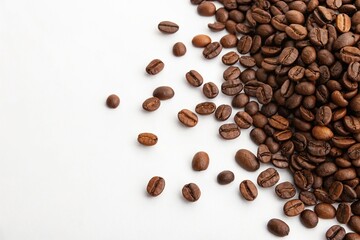 Obraz premium A heap of coffee beans on a clean and minimalist white background with scattered edges, heap, coffee beans