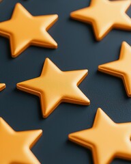 Obraz premium A collection of shiny orange stars scattered on a dark background, creating a vibrant and playful visual effect.