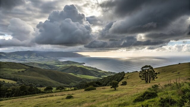 Dark grey clouds gather over the rolling hills and vast ocean, foreboding skies, stormy weather, rain in distance