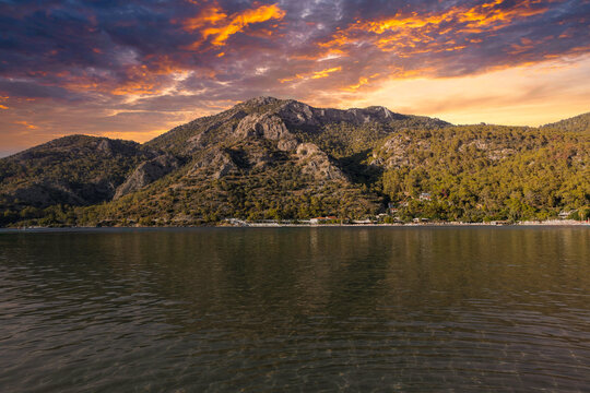 Mugla, Fethiye - Turkiye - 18 October 2024: View of The Beach Near Sunset