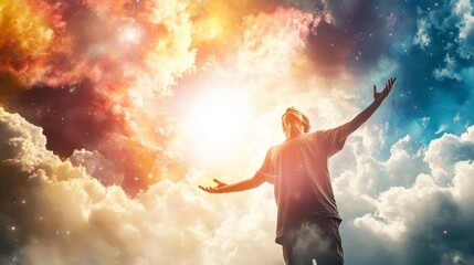 A man is reaching up to the sky with his hands outstretched