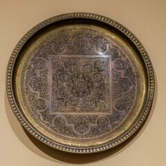 antique uzbek metal plate with floral ornament