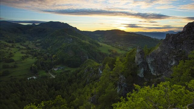 Time lapse of Sunset in  mountain with sun, forest and rocks in Slovakia, summer landscape panorama - Hricov