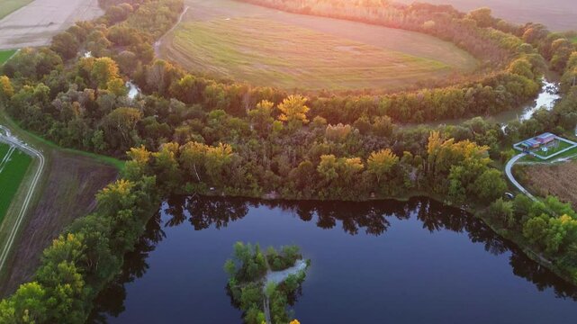 Sunset at Danube river meandering through romantic Slovakia countryside nature landscape Near Senec from drone.