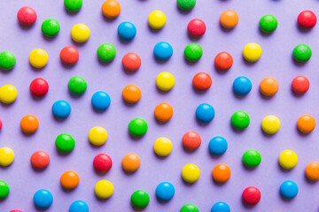 colorful candies as background top view. Seamless pattern with candy. Many sweet candies close-up