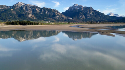 The dry forggensee Bavarian nature scene close to the Füssen Allgäu mountain chain