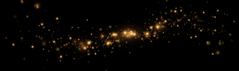 The dust sparks and golden stars shine with special light. Vector sparkles on a transparent background. Christmas light effect. Sparkling magical dust particles.  © kulinskaia