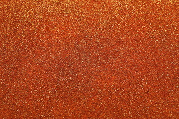 Shiny orange glitter texture background