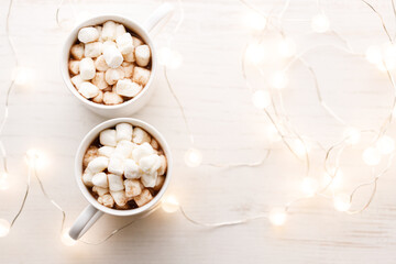 Cups of delicious hot chocolate and artisanal gift box