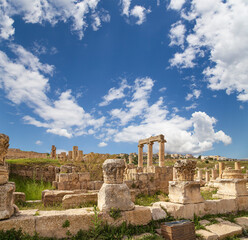 Roman ruins (against the background of a beautiful sky with clouds) in the Jordanian city of Jerash (Gerasa of Antiquity), capital and largest city of Jerash Governorate, Jordan