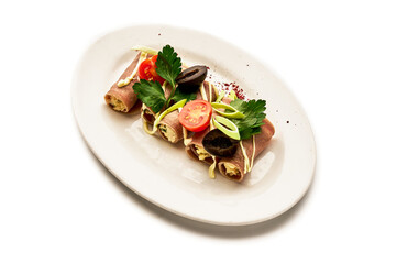 A plate of food with a white plate and a white background