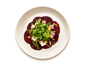 A plate of food with a salad on it