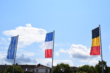 flags of France, Belgium and the EU