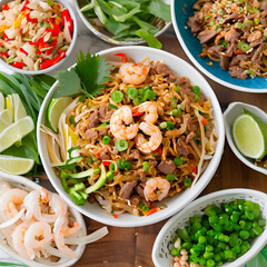 Asian stir fried pad thai with prawn, green onions and vegetables