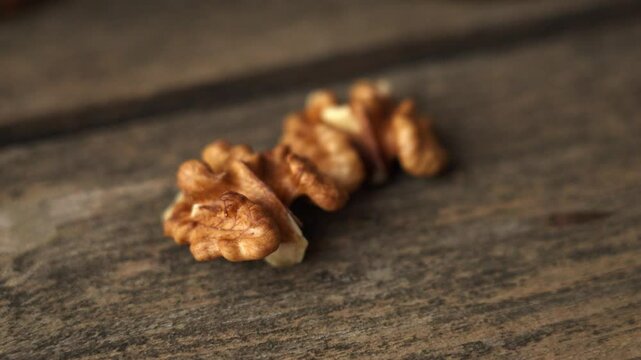 walnut kernel on a wooden table top