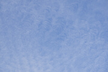 The sky looks like white waves.
