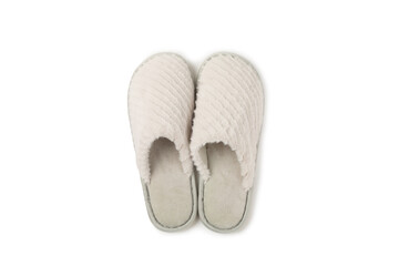 Soft slippers isolated on white background. Home slippers. Comfortable shoes for home. Foot care concept. Home comfort. Space for text. Copy space.