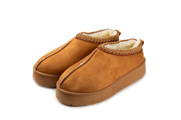 Soft slippers isolated on white background. Home slippers. Comfortable shoes for home. Foot care concept. Home comfort. Space for text. Copy space.