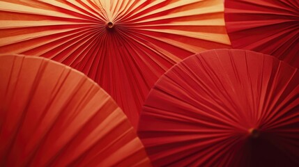 Vibrant close-up of decorative red paper lanterns showcasing intricate pleats and textures, ideal for festive celebrations and cultural events.