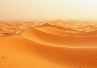 Desert landscape features golden sand dunes under clear blue sky at midday