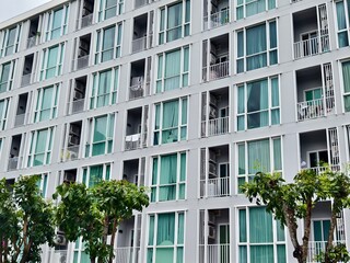 Detailed view of windows, doors and balconies of city buildings 