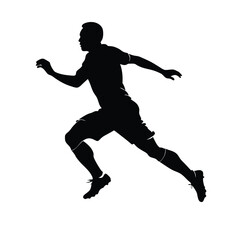 Fototapeta premium A man in a black shirt and shorts is kicking a soccer ball. He is running and kicking the ball with his right foot
