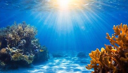 Mesmerizing Blue Ocean Background Showcasing Sunlight Streaming Through Crystal Clear Waters and a Stunning Undersea Scene with Vibrant Marine Life and Tranquil Aquatic Beauty