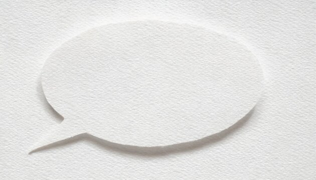 Paper speech bubble cutout on a textured white paper background, representing simplicity and communication