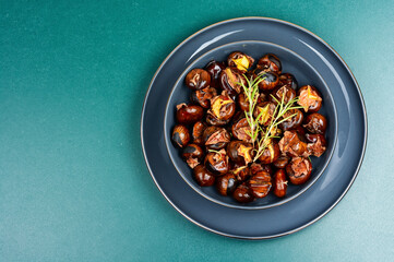 A plate of roasted chestnuts.