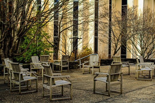 Chairs in a random order outside a building on UNC Asheville Campus