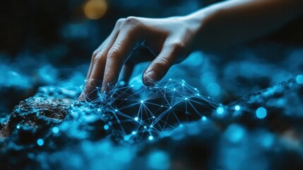 Hand touching glowing network on dark rocks.