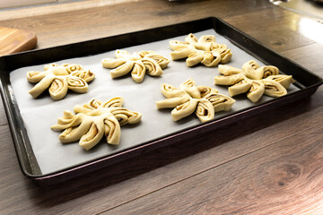 Puff pastry flowers with cinnamon sugar.Puff pastry. Dessert. Cinnamon. Sugar. Food concept