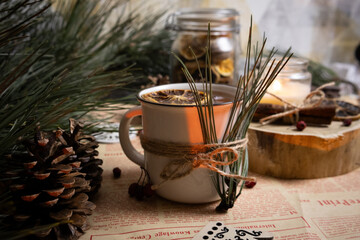 Cozy decorated tea mug with a Christmas background Warm light