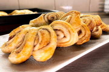 Puff pastry flowers with cinnamon sugar.Puff pastry. Dessert. Cinnamon. Sugar. Food concept