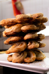 Puff pastry flowers with cinnamon sugar.Puff pastry. Dessert. Cinnamon. Sugar. Food concept