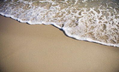 Sand and sea wave. Beach copy space nature background